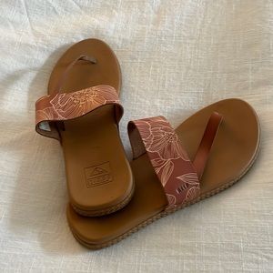 Super cute Reef sandals light brown in color.
